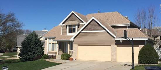 Sandstone, Sierra and Cream House with new siding